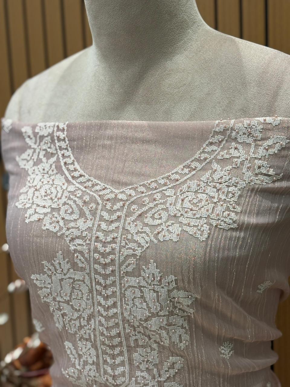 Experience elegance with our exquisite unstitched suit set