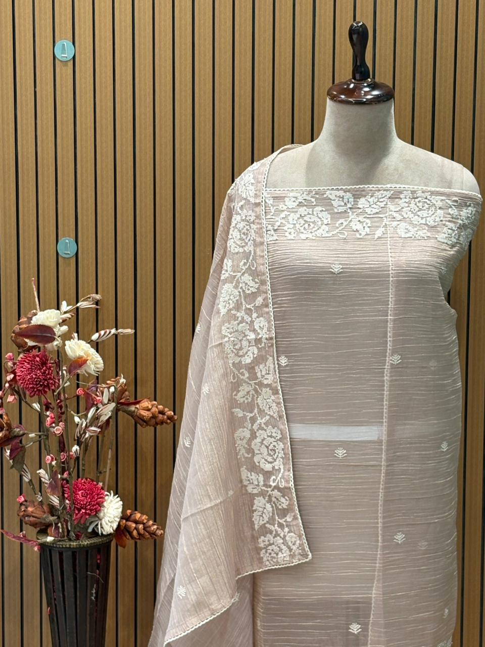 Experience elegance with our exquisite unstitched suit set