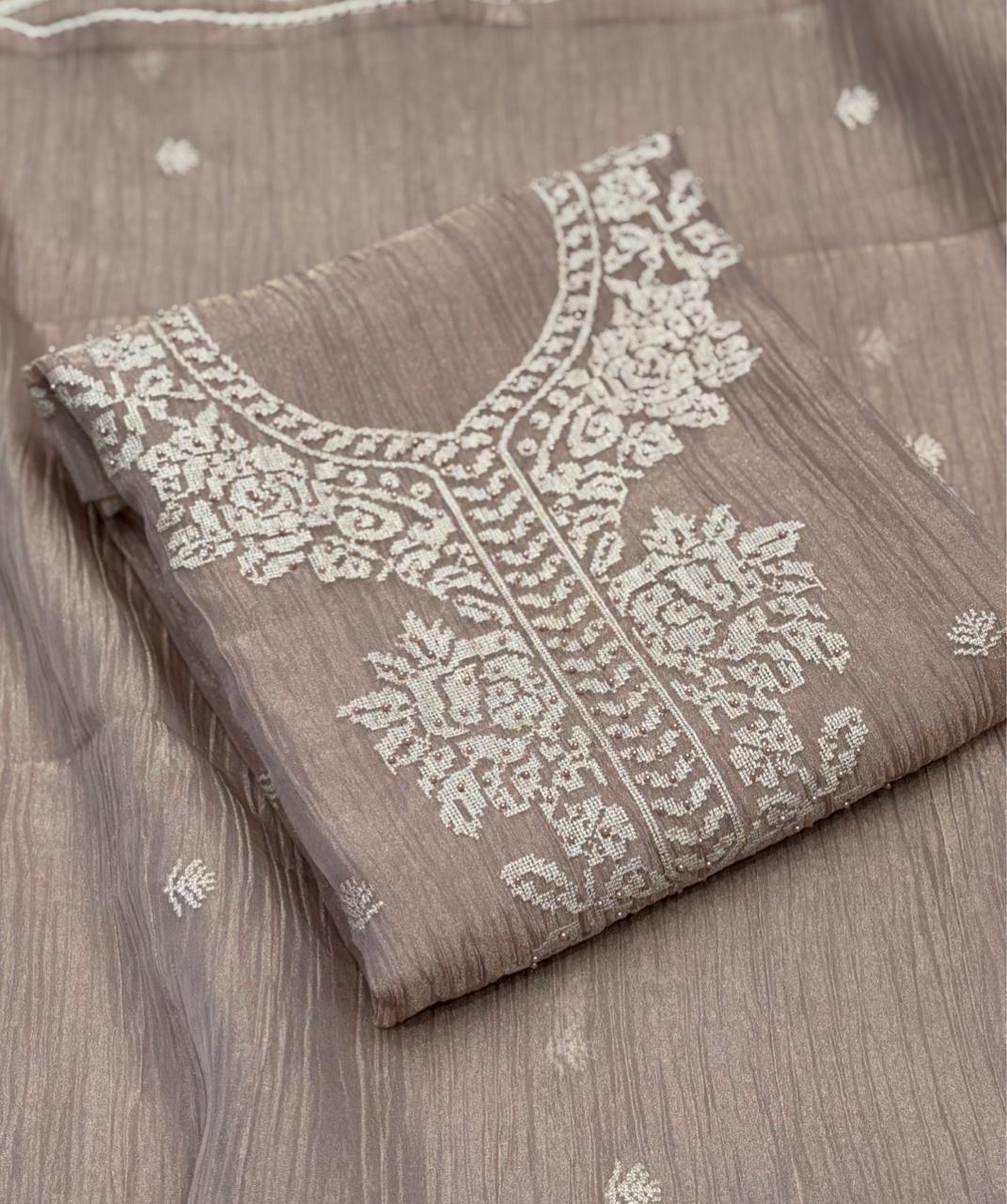 Experience elegance with our exquisite unstitched suit set