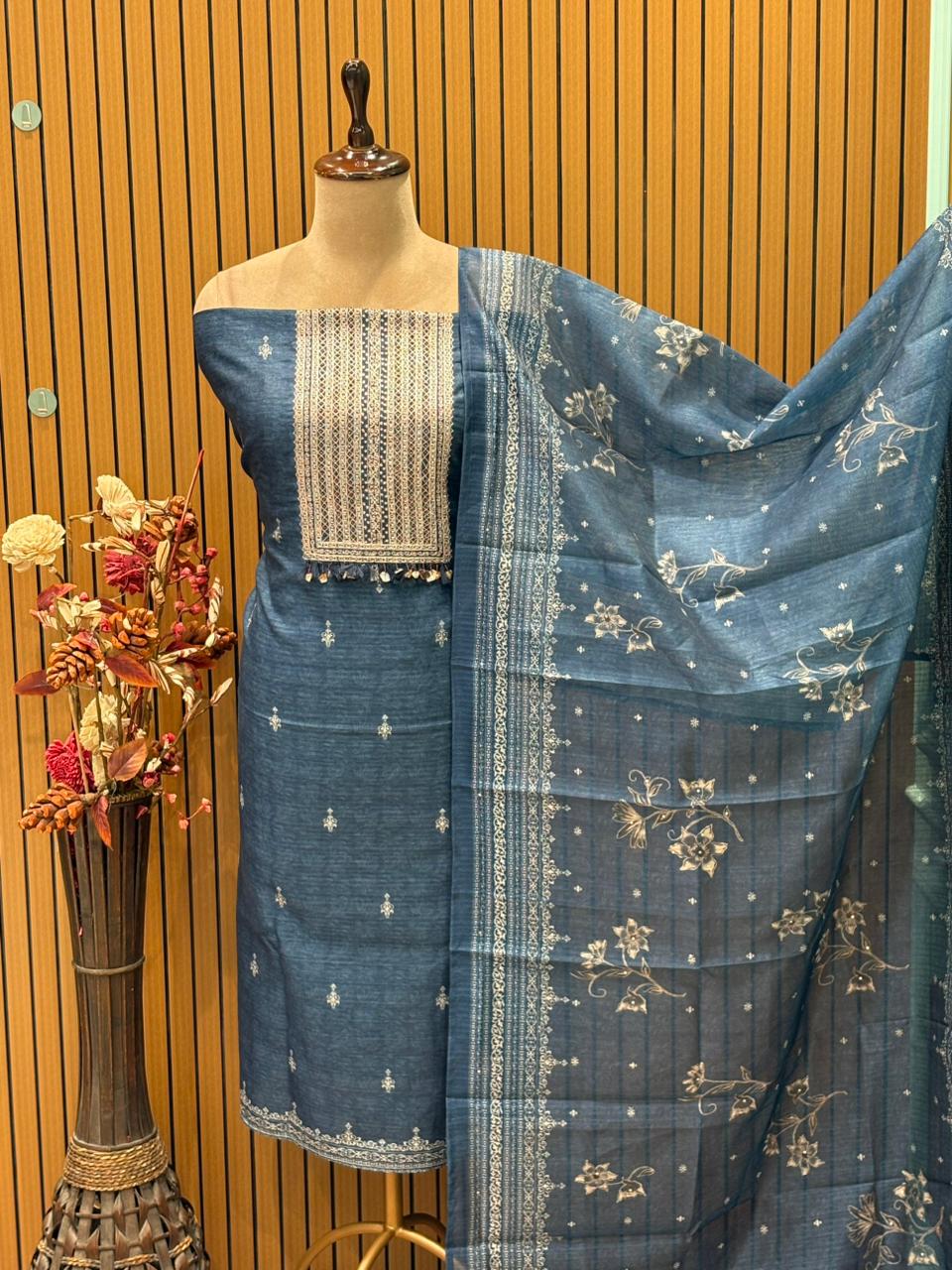 Step into elegance with our premium unstitched suit set