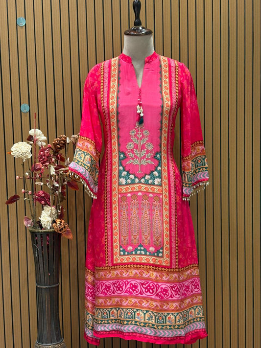 Radiate festive charm in this vibrant pink crape suit set