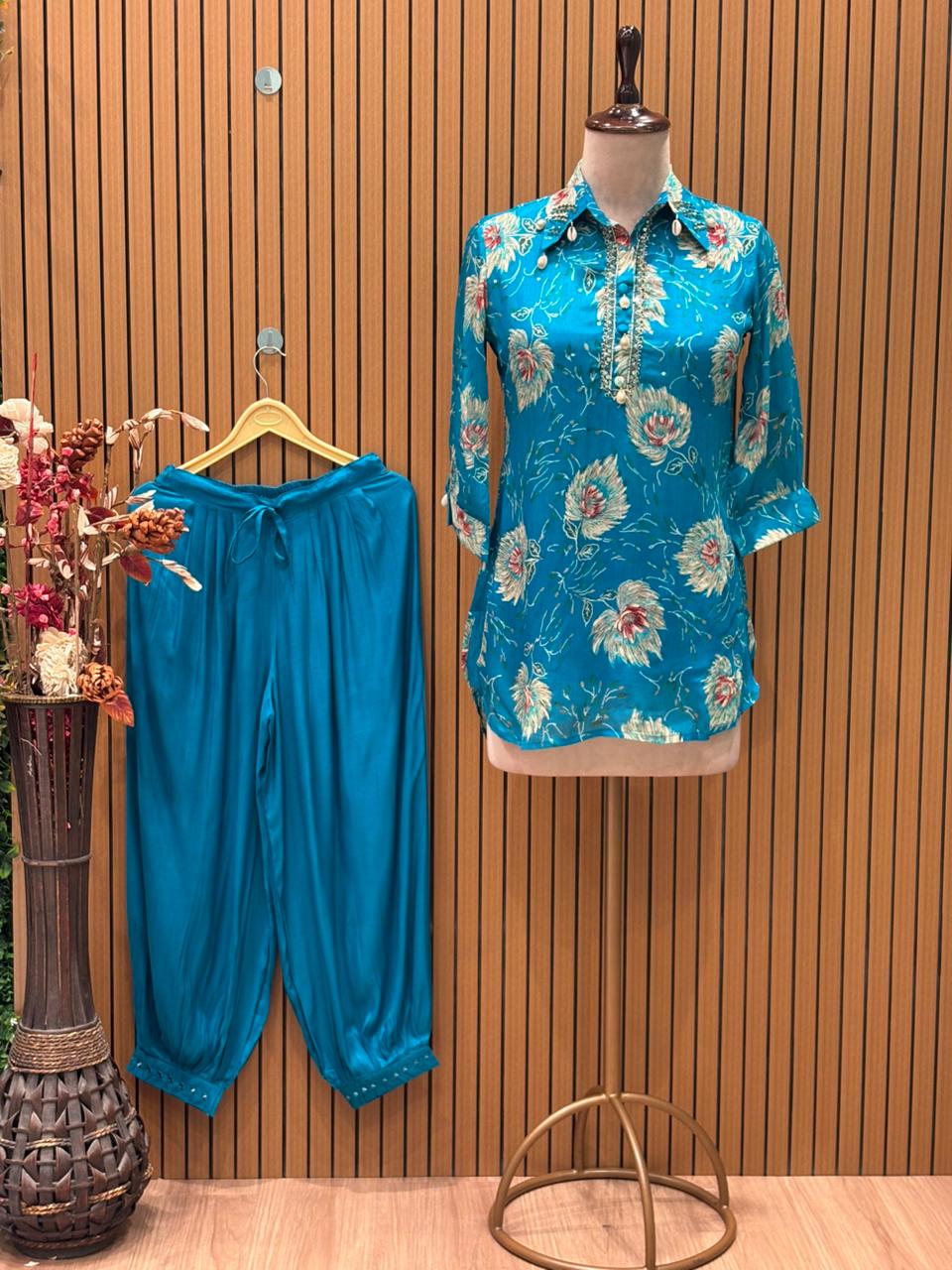 Floral co-ord sets in firozi blue and vibrant maroon red bring a fresh