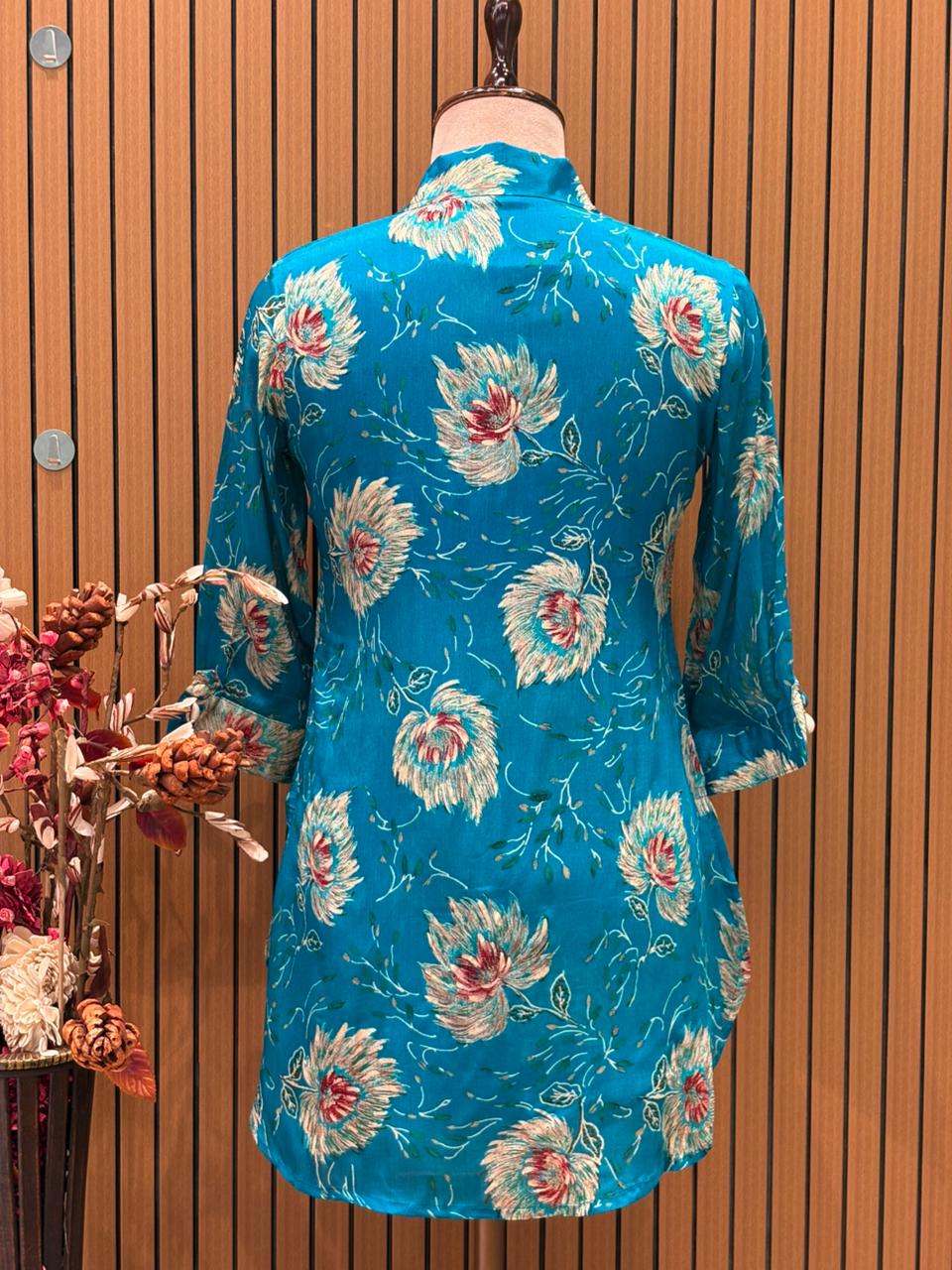 Floral co-ord sets in firozi blue and vibrant maroon red bring a fresh