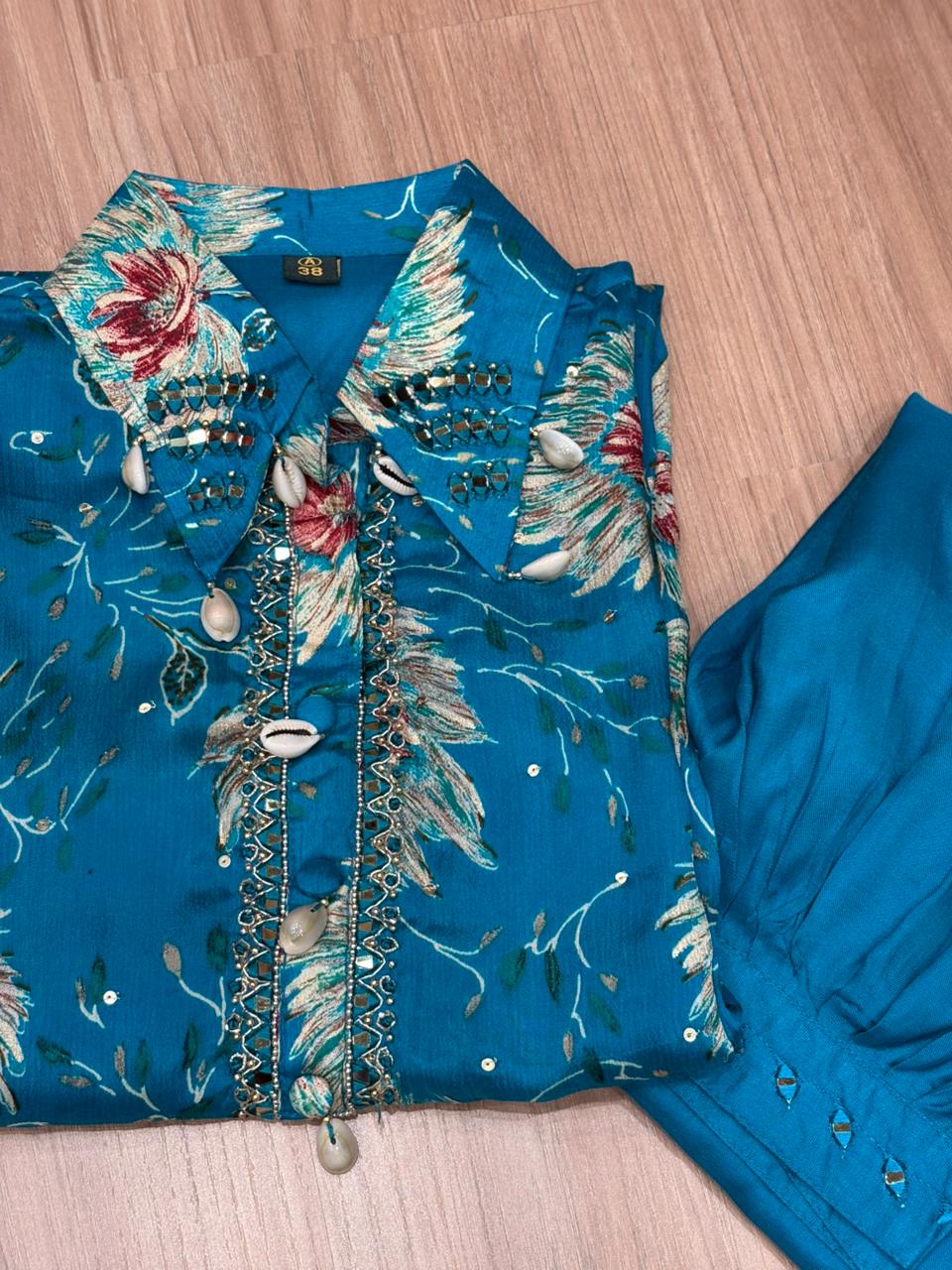 Floral co-ord sets in firozi blue and vibrant maroon red bring a fresh