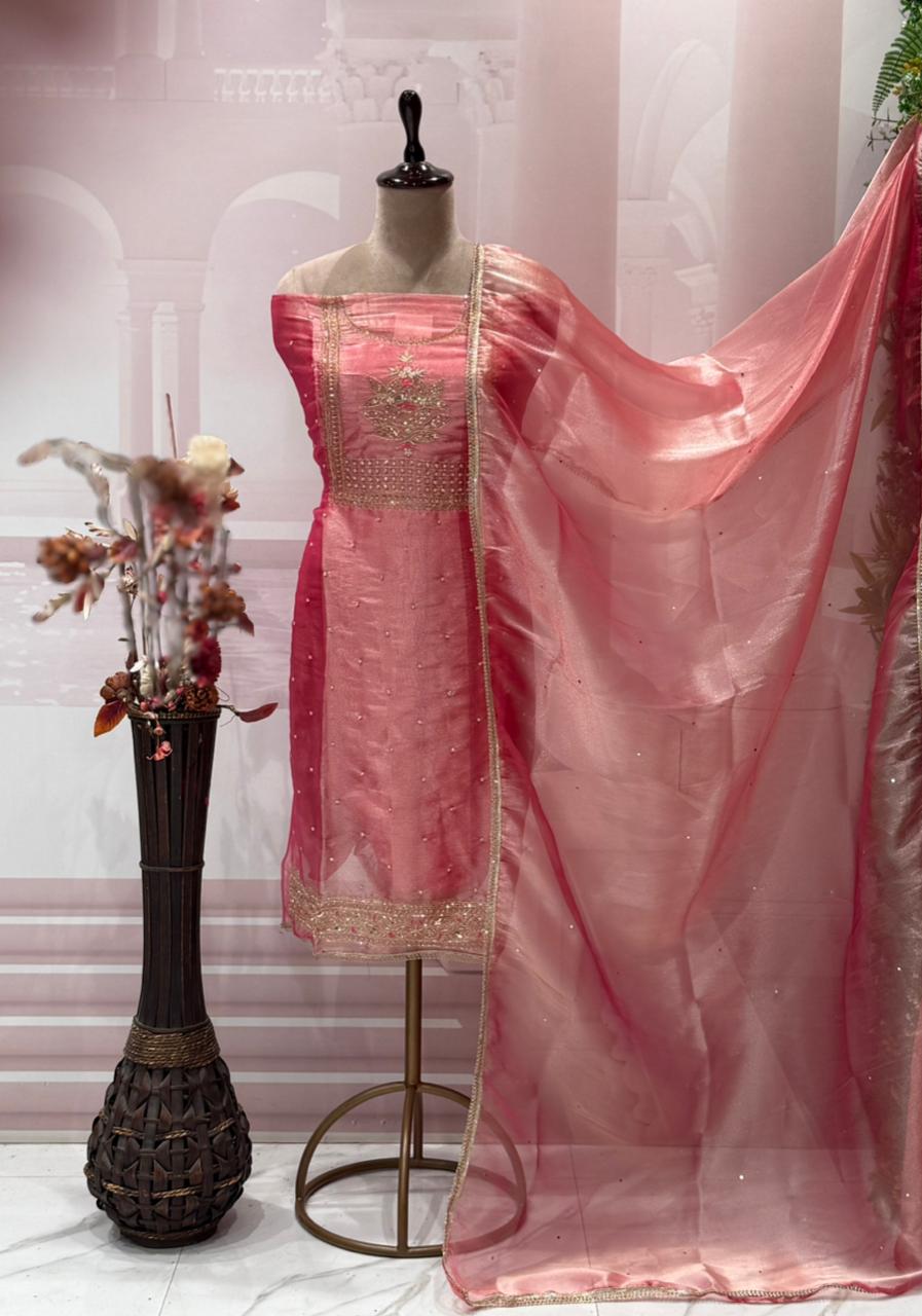 Step into elegance with this luxurious unstitched suit set