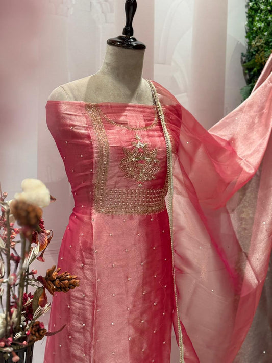 Step into elegance with this luxurious unstitched suit set