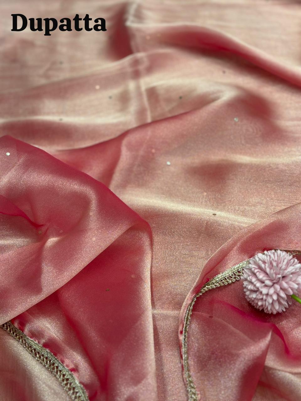 Step into elegance with this luxurious unstitched suit set