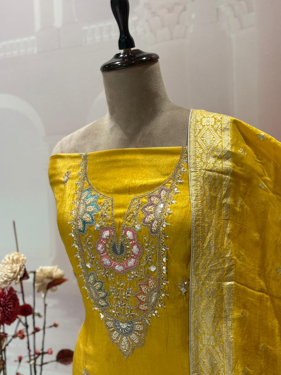 Experience sheer elegance with this exquisite unstitched suit set