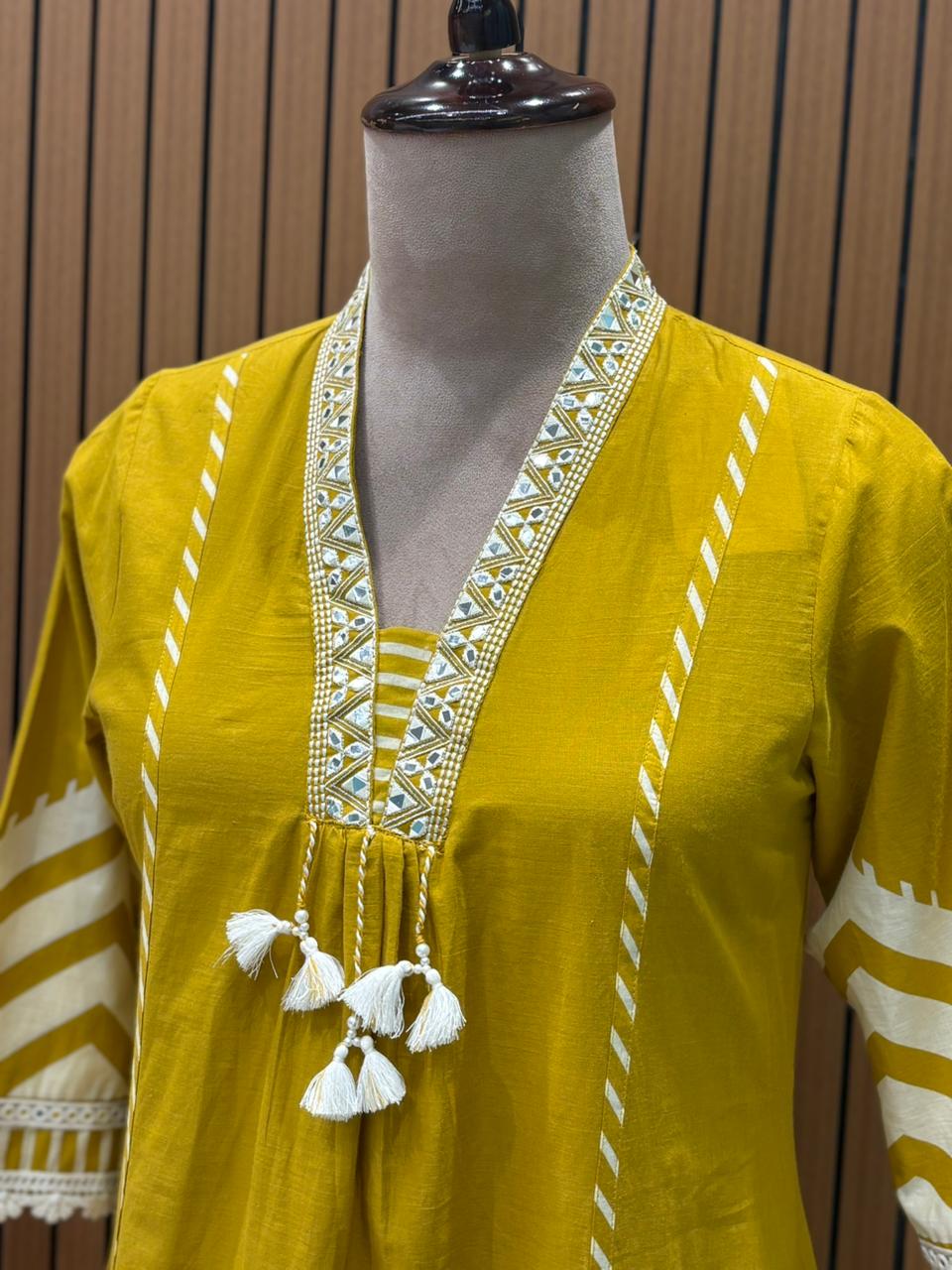 Mustard yellow cotton A-line kurti with chic chevron print