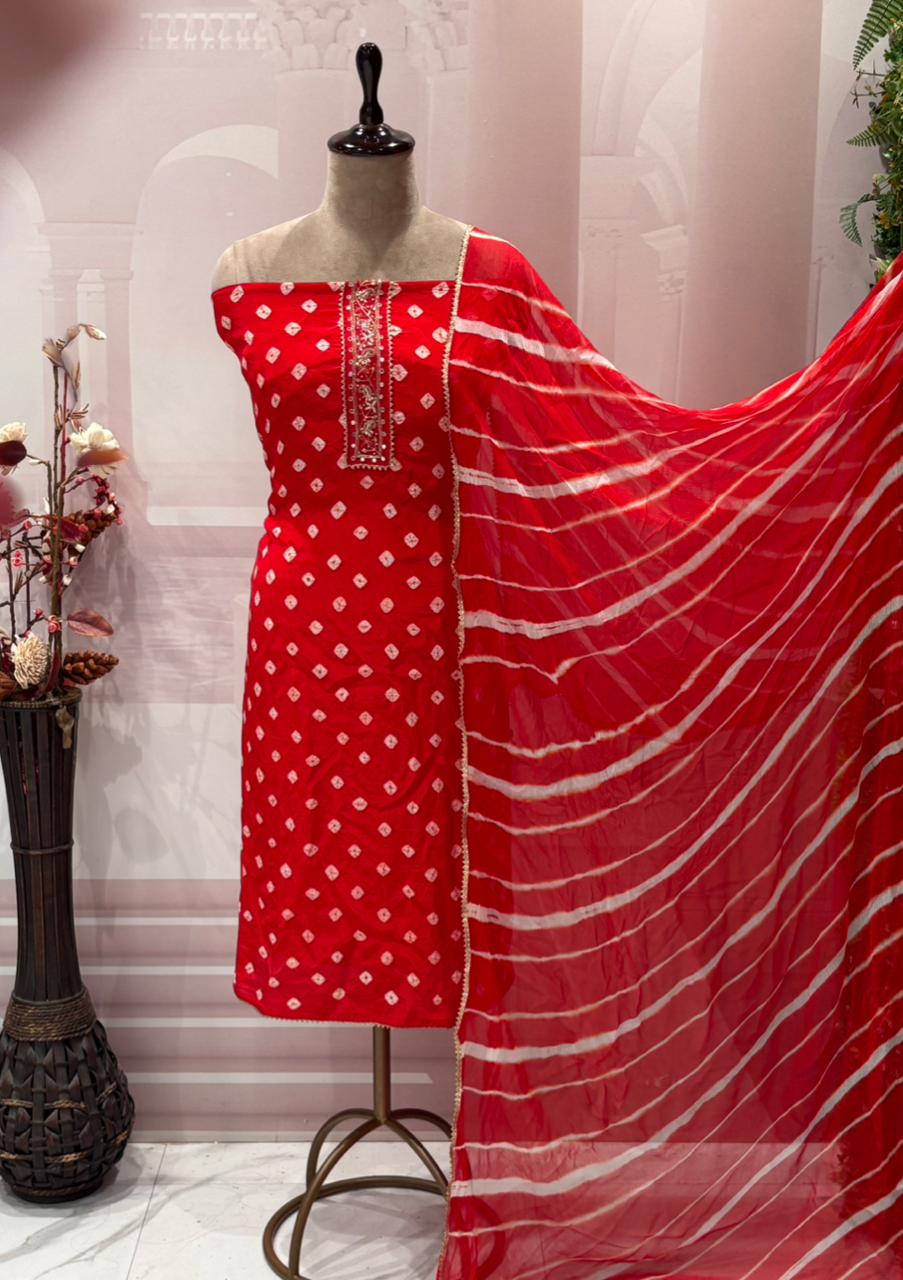 Unstitched elegance meets tradition in this stunning Bandhej print suit set