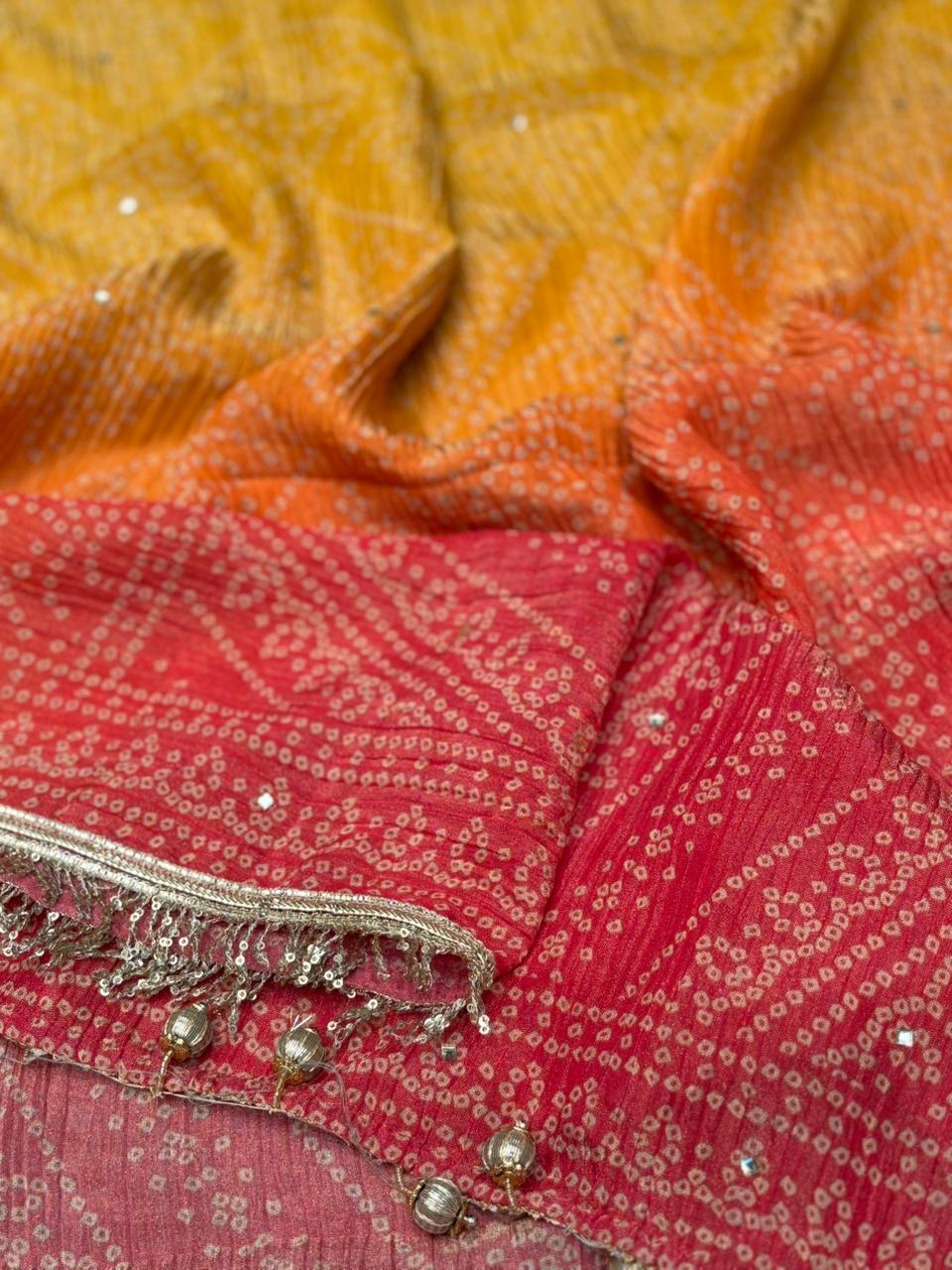Exquisite unstitched suit set is crafted from premium crush tissue shimmer fabric