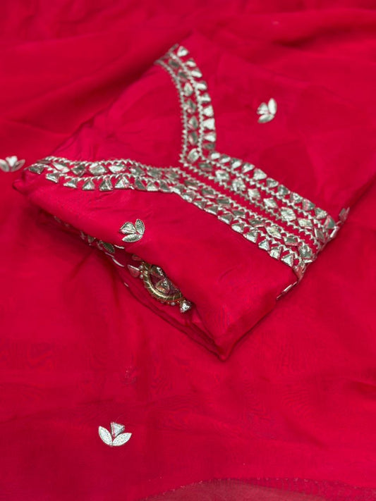 Elevate your festive style with our luxurious unstitched suit