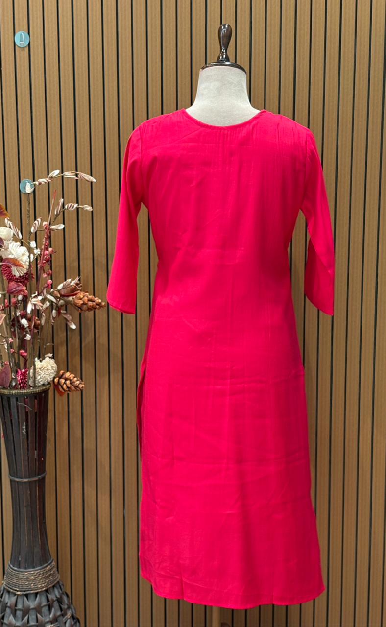 Grace your festive wardrobe with this vibrant pink muslin kurti set,