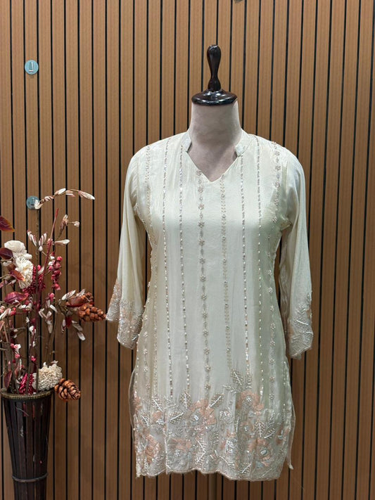 Elegant short kurti in premium tissue shimmer with intricate handwork