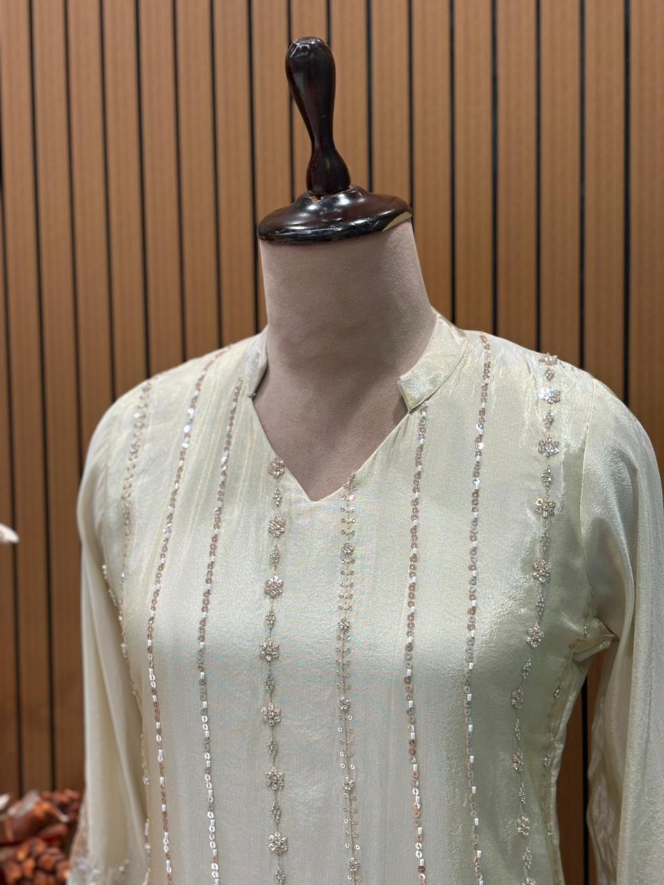 Elegant short kurti in premium tissue shimmer with intricate handwork