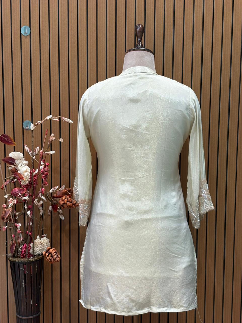 Elegant short kurti in premium tissue shimmer with intricate handwork