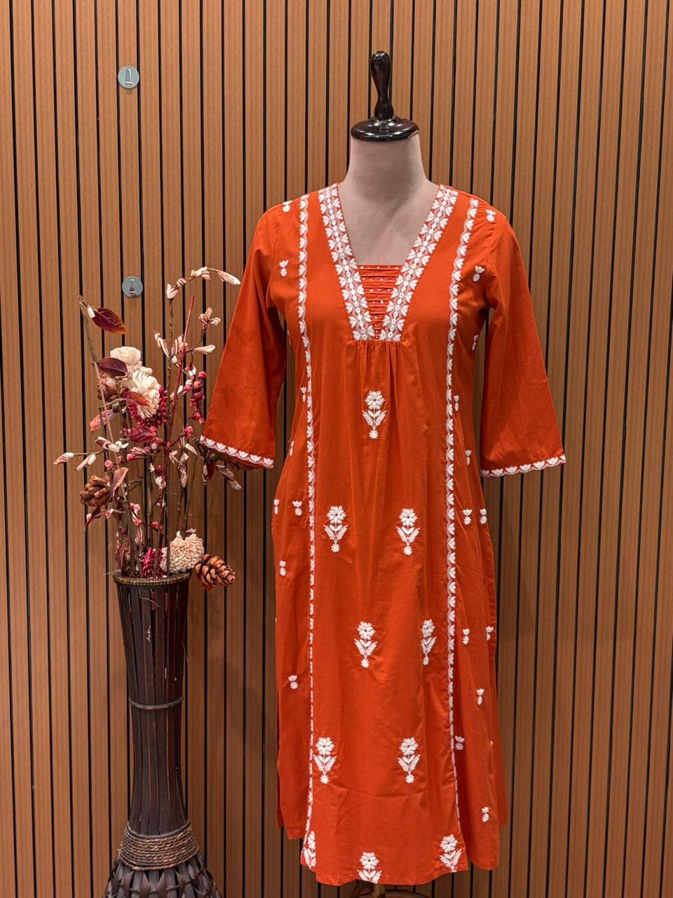 Graceful A-line cotton kurti set in vibrant orange