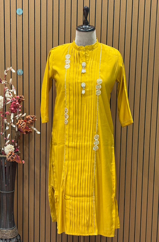Brighten your festive look with this mustard muslin kurti set