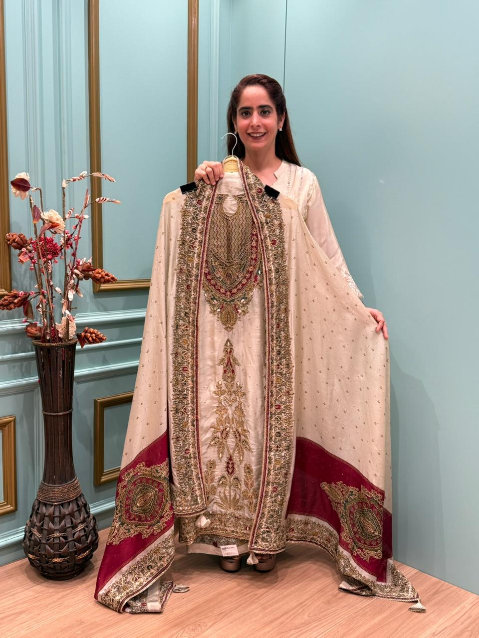 Elevate your festive wardrobe with our luxurious unstitched suit