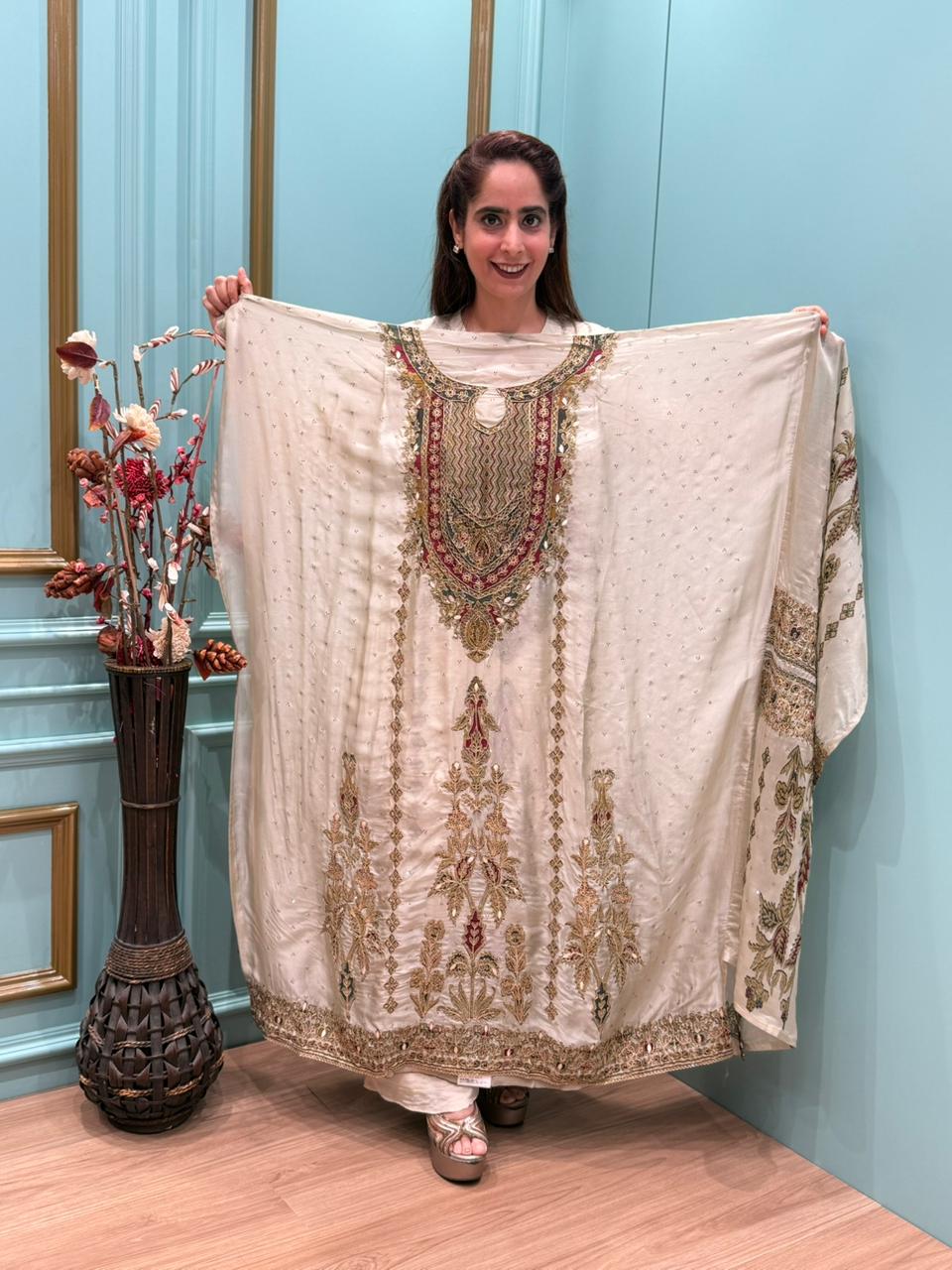 Elevate your festive wardrobe with our luxurious unstitched suit