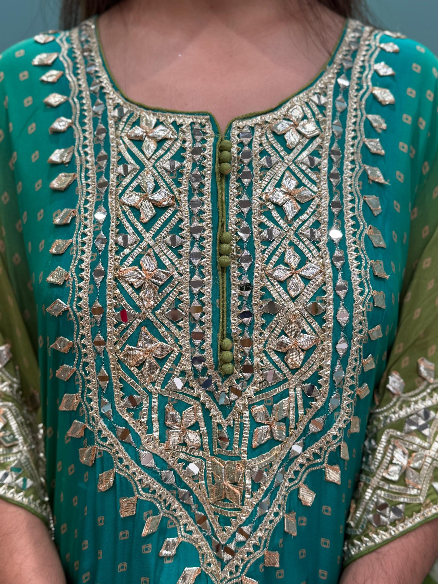 Redefine festive elegance with our stunning kaftan set crafted in luxurious crape fabric
