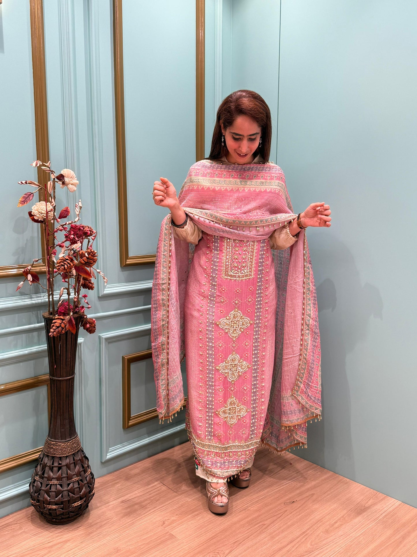 Elegance with our unstitched suit collection crafted in rich crush tissue shimmer