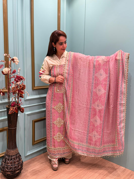 Elegance with our unstitched suit collection crafted in rich crush tissue shimmer