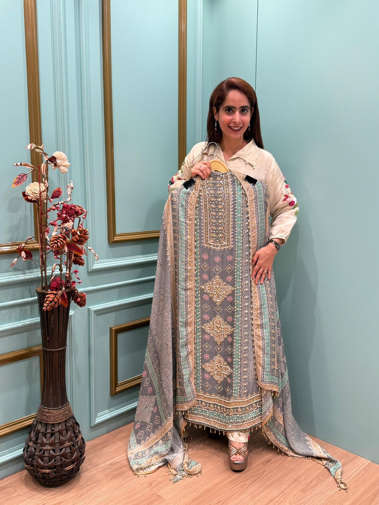 Elegance with our unstitched suit collection crafted in rich crush tissue shimmer