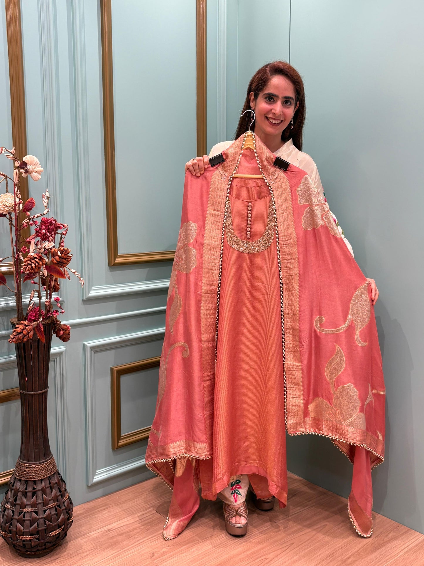 Unveil the beauty of tradition with a modern glow in our Organza Shimmer