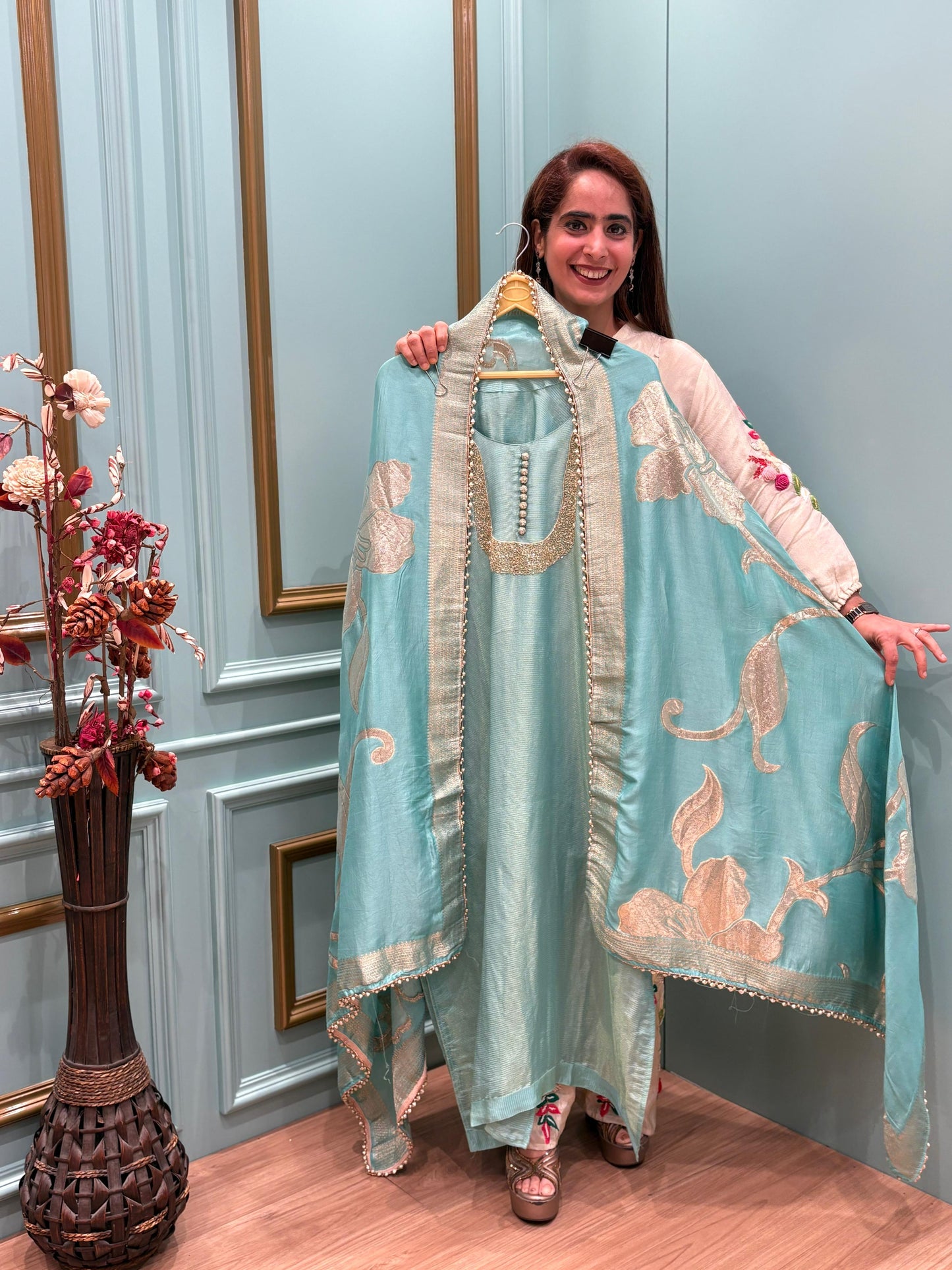 Unveil the beauty of tradition with a modern glow in our Organza Shimmer
