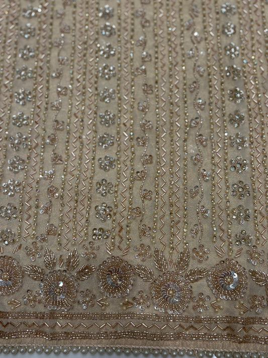 Grace meets grandeur with our unstitched suit in Organza shimmer