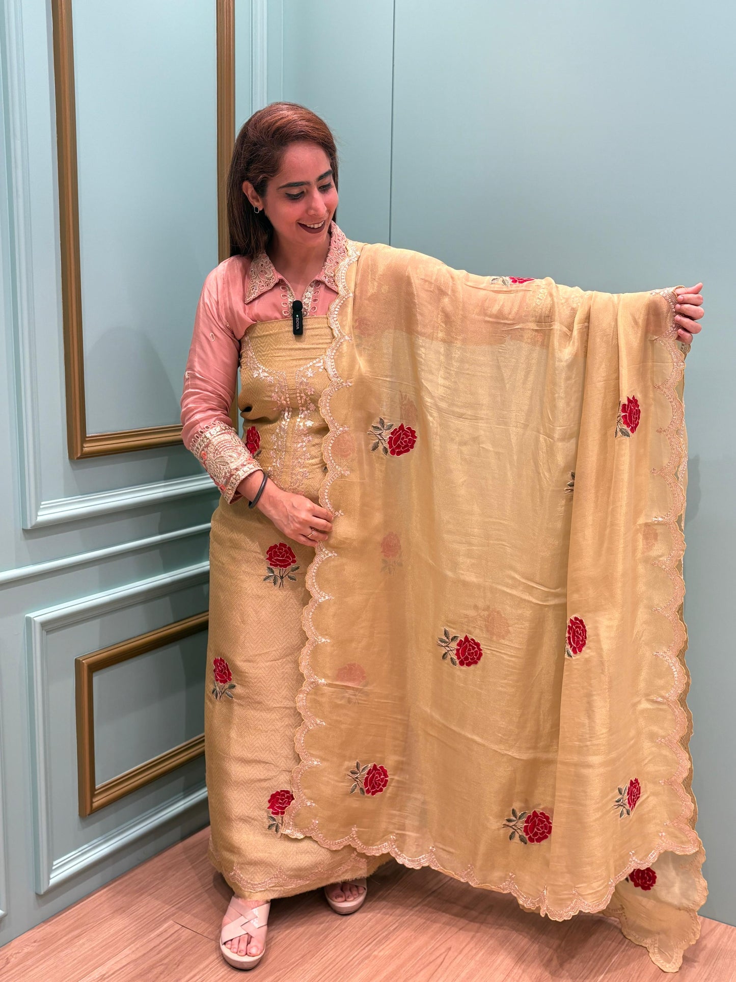 Unstitched Organza Zakot Suit, a masterpiece designed for the modern woman