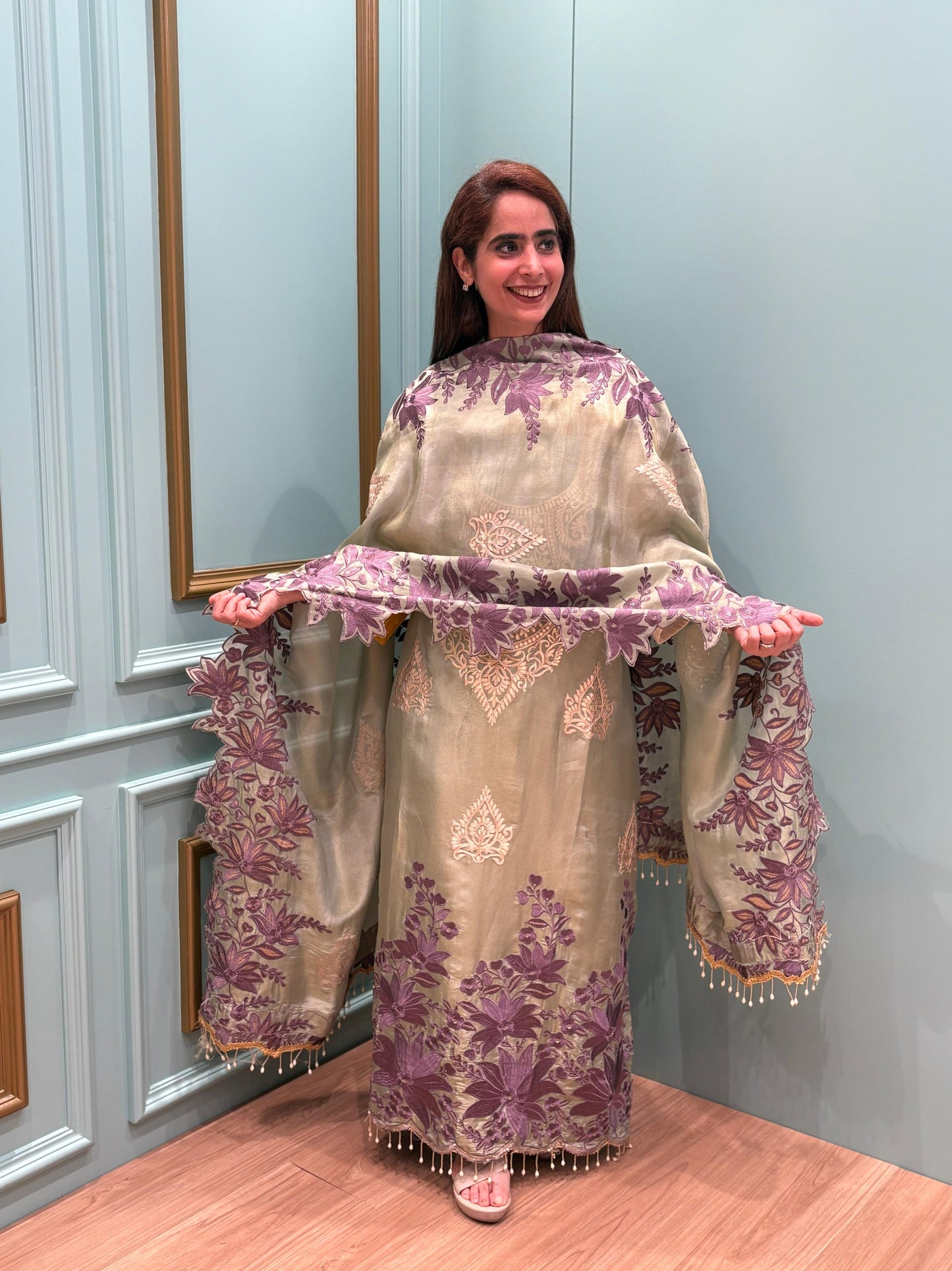 Step into elegance with our premium unstitched organza shimmer suits