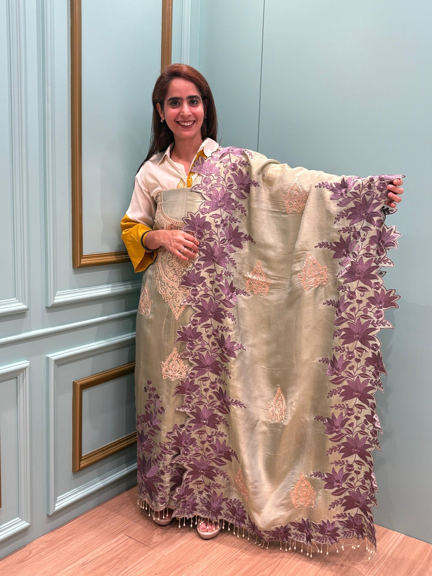 Step into elegance with our premium unstitched organza shimmer suits