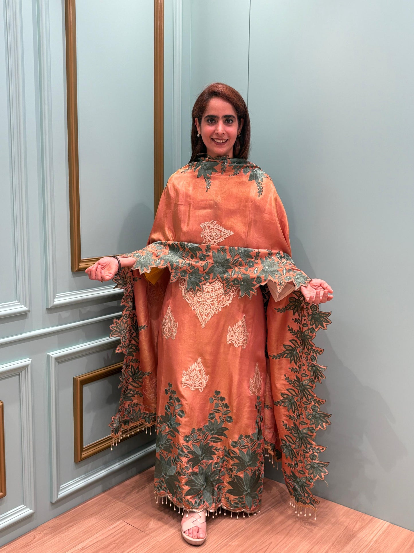 Step into elegance with our premium unstitched organza shimmer suits