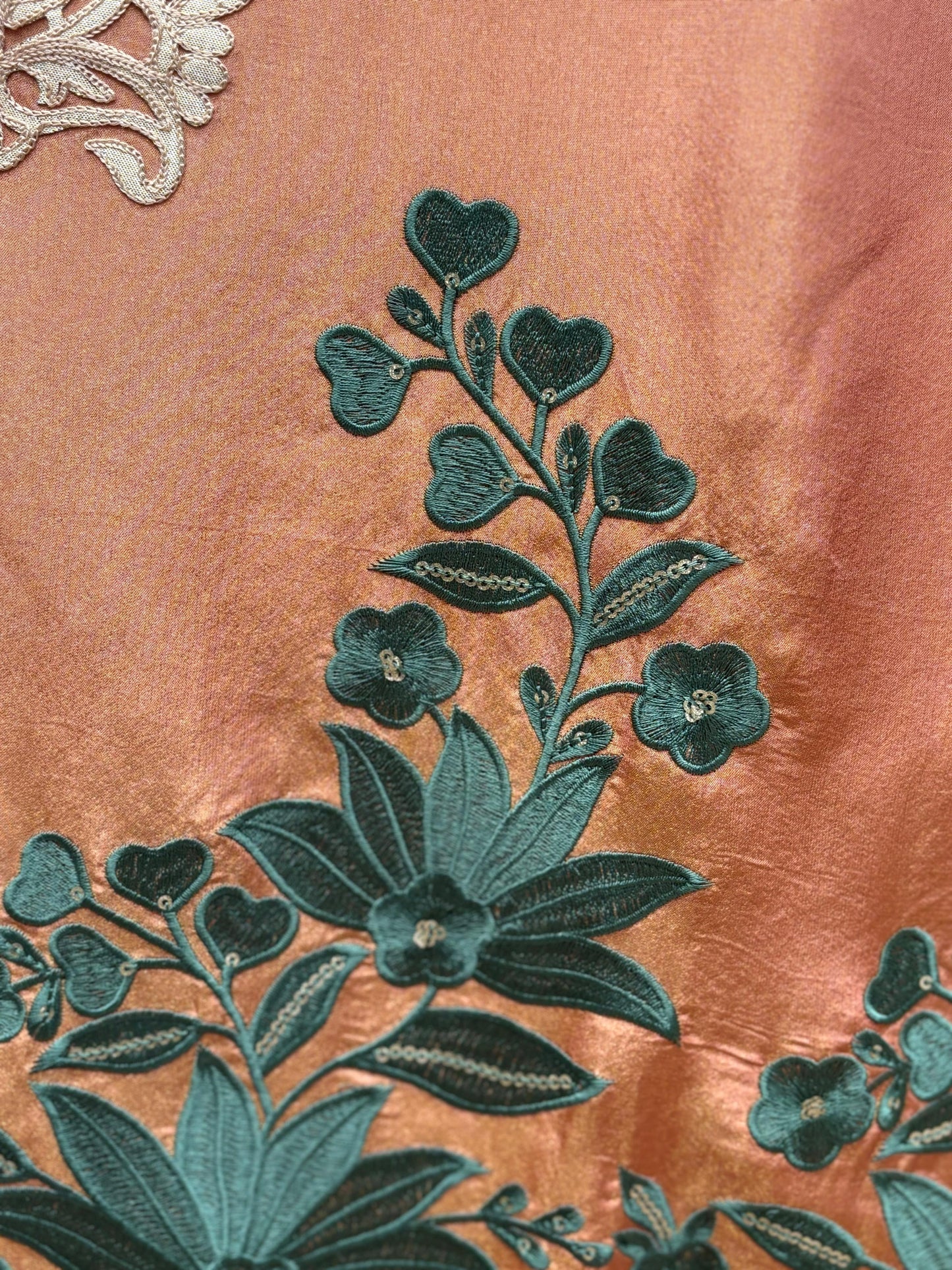 Step into elegance with our premium unstitched organza shimmer suits