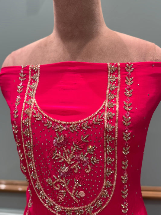 Unveil timeless elegance with our premium unstitched suit