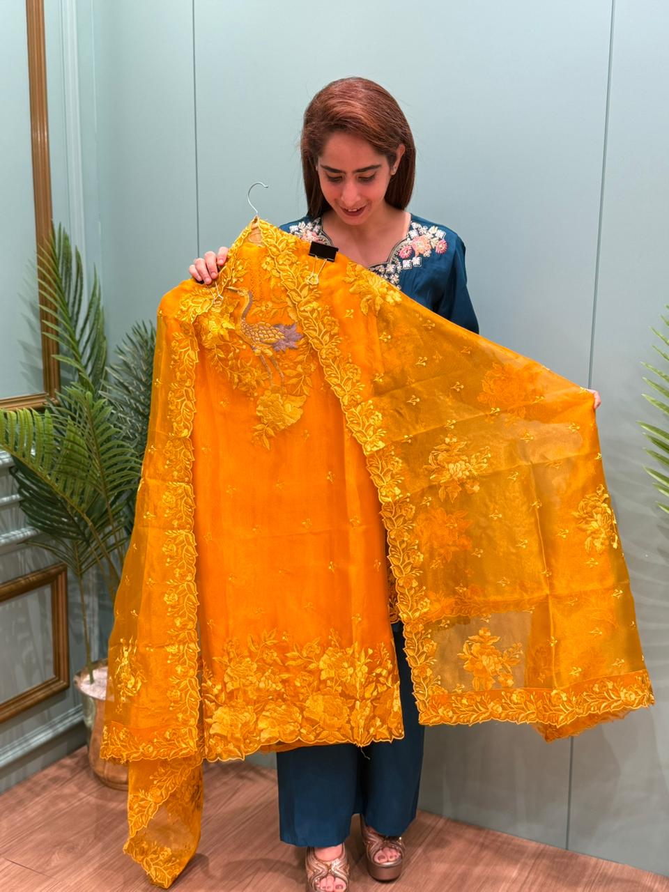 Unstitched suit collection in organza shimmer fabric
