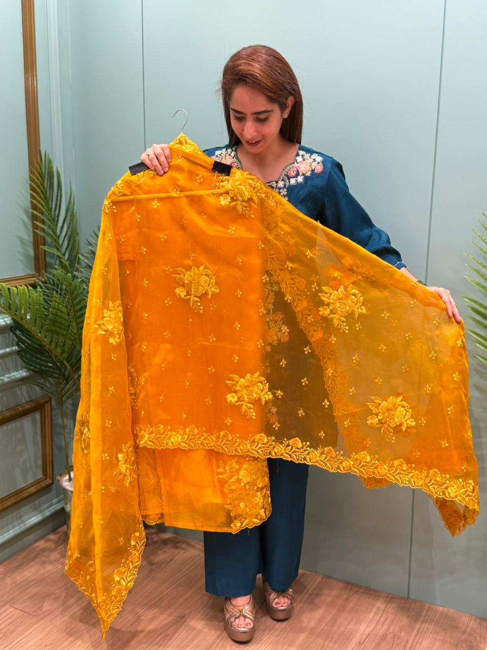 Unstitched suit collection in organza shimmer fabric