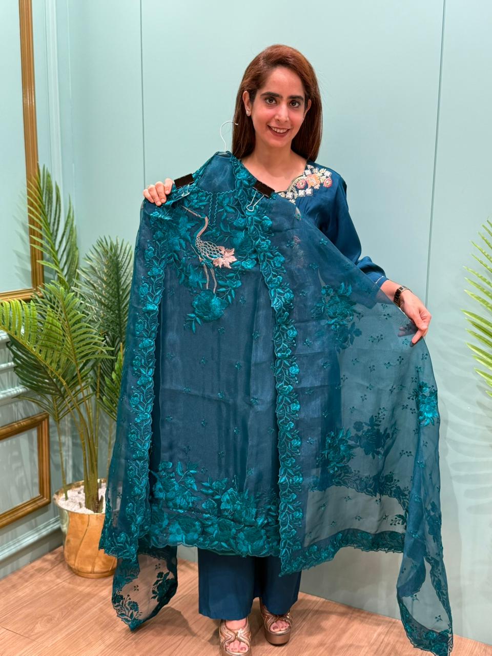 Unstitched suit collection in organza shimmer fabric