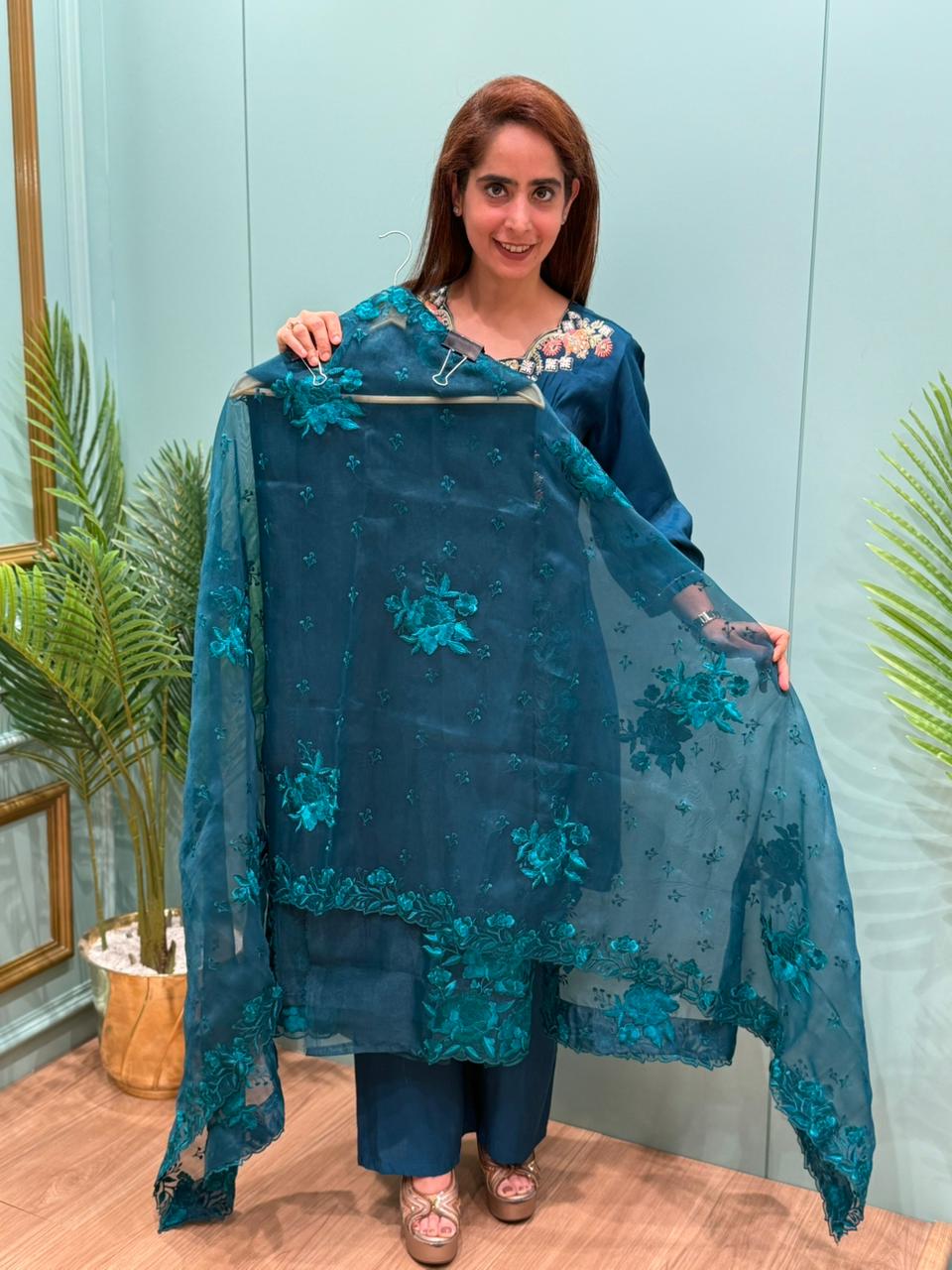 Unstitched suit collection in organza shimmer fabric