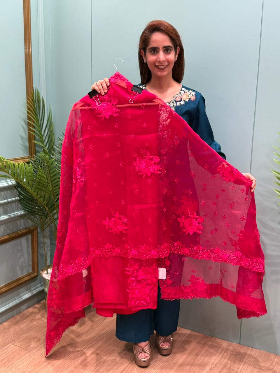 Unstitched suit collection in organza shimmer fabric