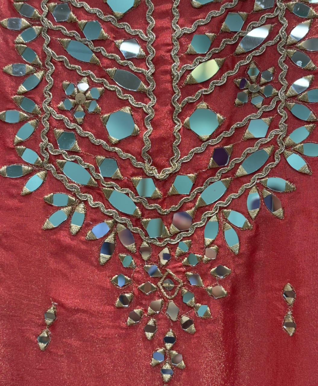 Organza Shimmer Unstitched Suit featuring all-over mirror work