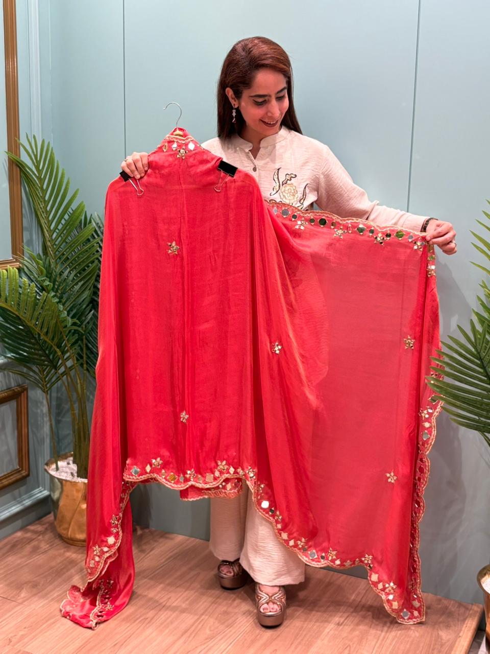 Organza Shimmer Unstitched Suit featuring all-over mirror work