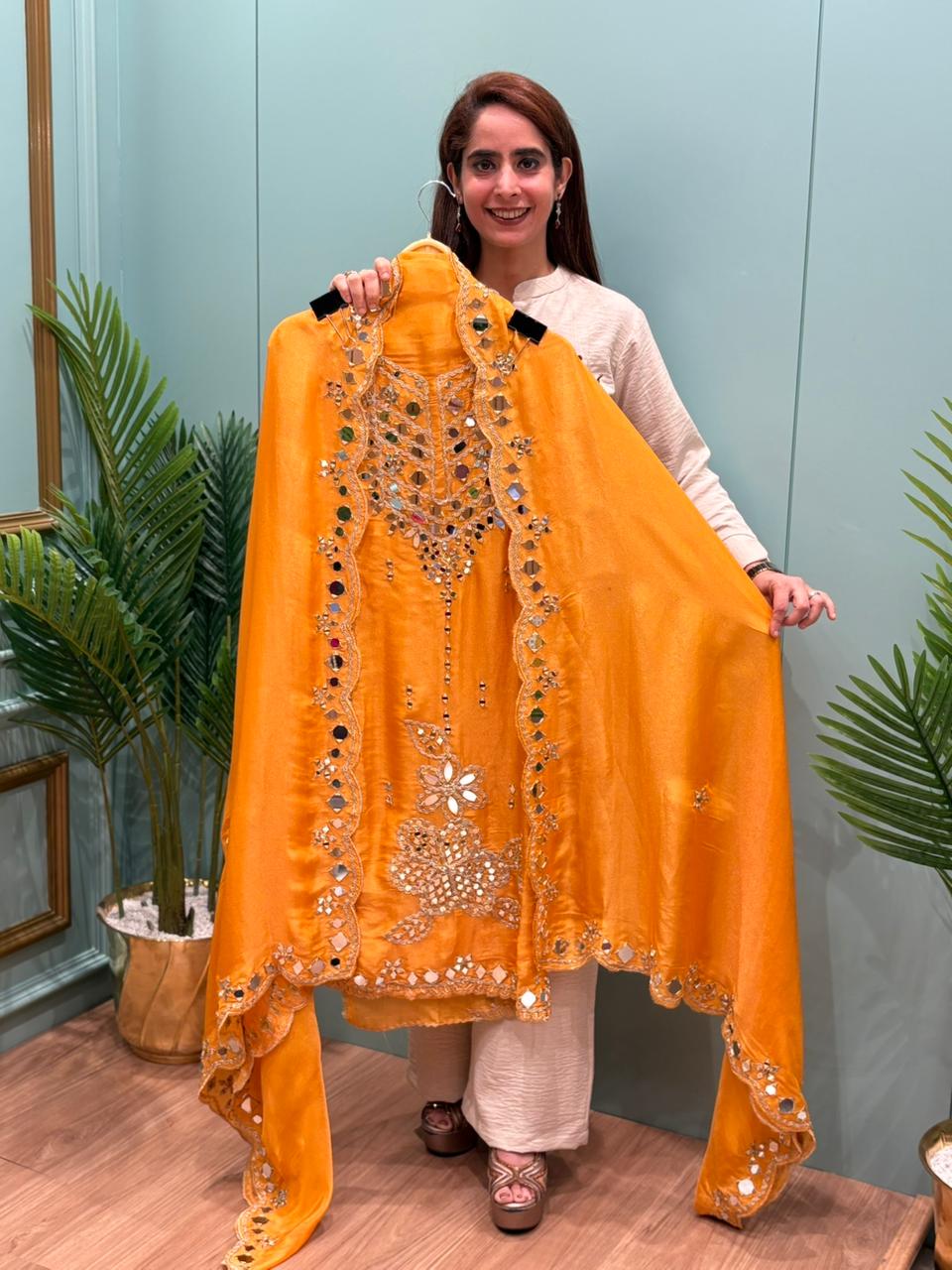 Organza Shimmer Unstitched Suit featuring all-over mirror work