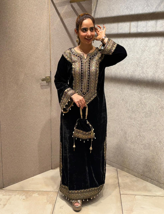 Redefine luxury with our Velvet Pheran, crafted