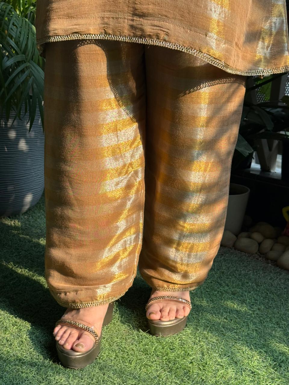 Elegant cord set crafted in luxurious tissue silk fabric