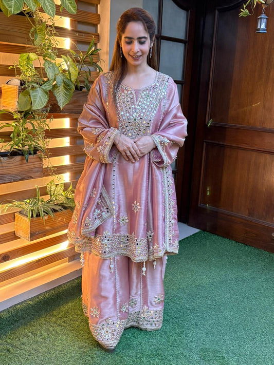 Exquisite Anarkali set is crafted in luxurious tissue silk fabric