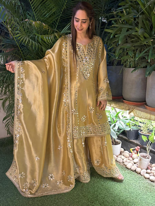 Exquisite Anarkali set is crafted in luxurious tissue silk fabric