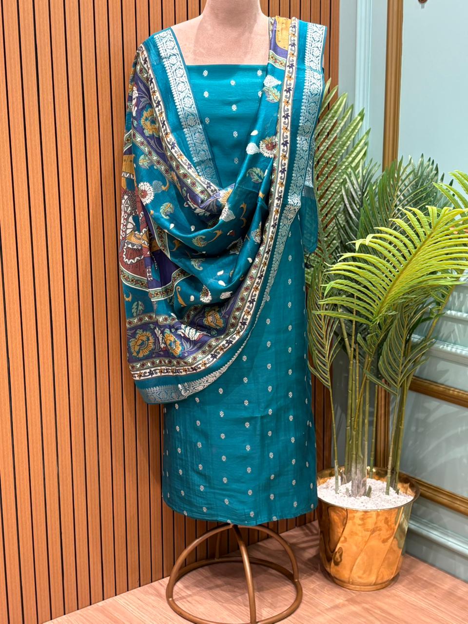 Elegant unstitched fabric suit is crafted with a premium Maheshwari fabric